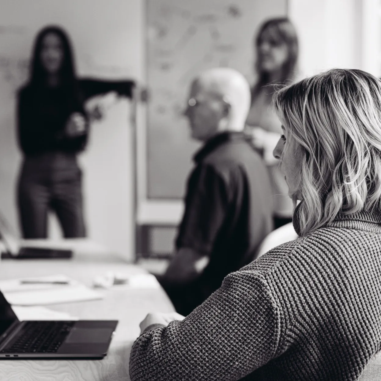 People meeting in a conference room.